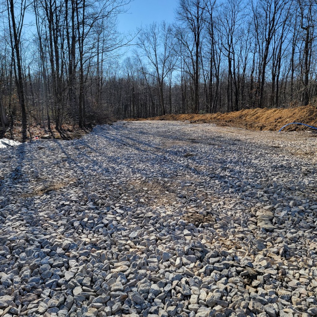 Looking down the roughed in drive from the parking lot.