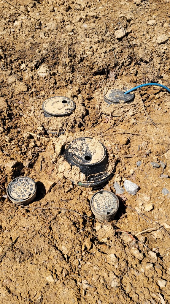 4" main branching into three, of what will eventually be ten meters.