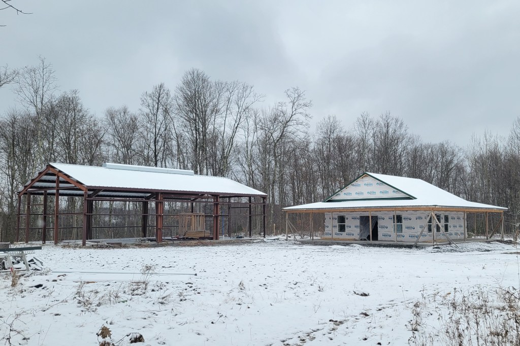 A winter view of the partially completed buildings at Cedar